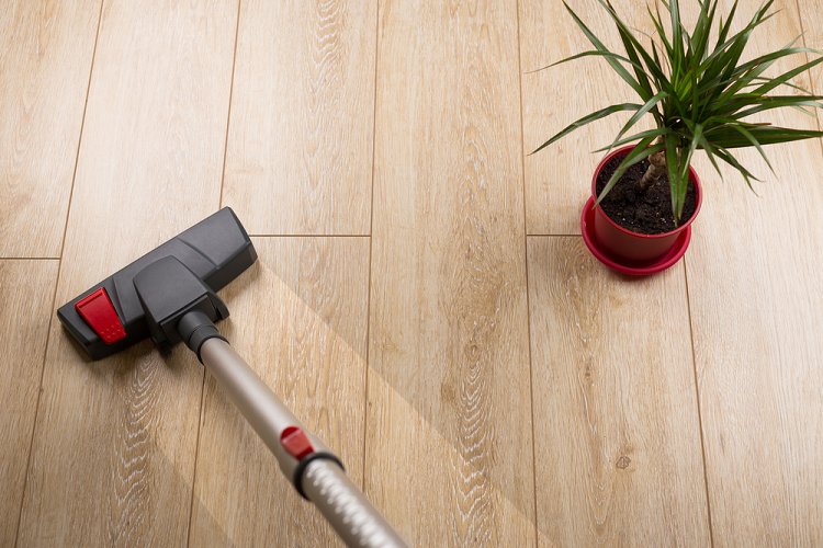 How do you vacuum a vinyl floor?