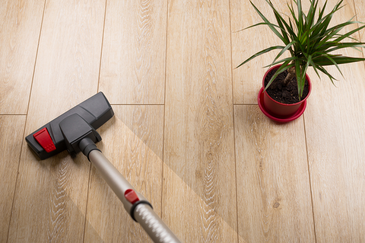 Vacuum and mop your laminate floors once a week 