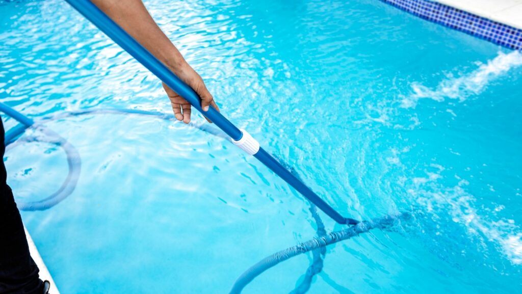 how to vacuum inground pool